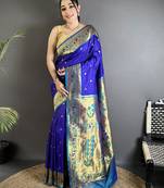 Women blue ikkat floral motifs lichi silk saree
