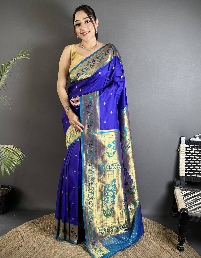 Women blue ikkat floral motifs lichi silk saree