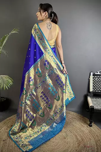 Women blue ikkat floral motifs lichi silk saree