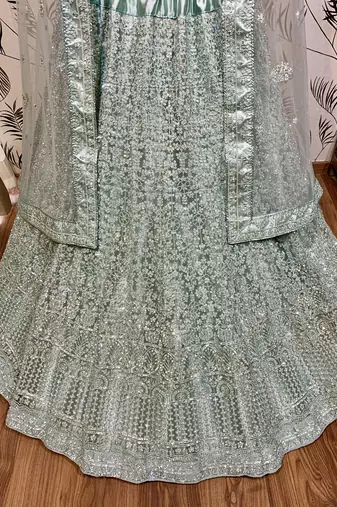 Soft Premium Net Wedding Wear Lehenga In Light Sea Green With Luckhnowi Work & Stone Work