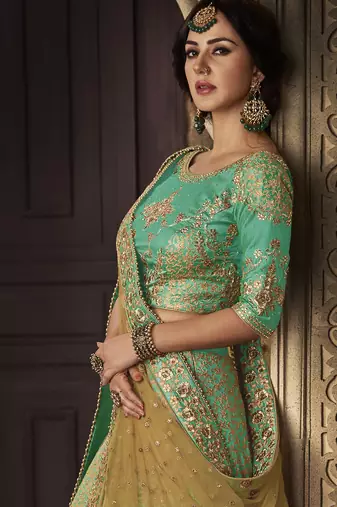 Pure Satin Silk Wedding Wear Lehenga In Green Color With Embroidery Work & Stone work