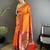 Women orange peacock&floral motifs lichi silk saree