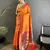 Women orange peacock&floral motifs lichi silk saree