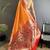 Women orange peacock&floral motifs lichi silk saree