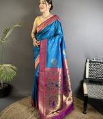 Women teal blue peacock&floral motifs lichi silk saree