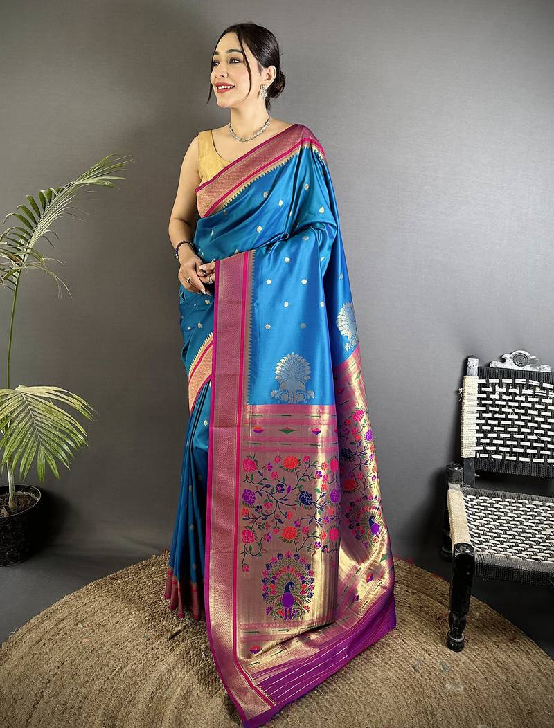 Women teal blue peacock&floral motifs lichi silk saree