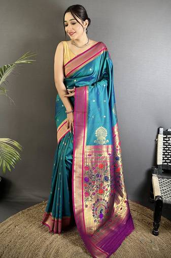 Women teal peacock&floral motifs lichi silk saree