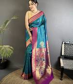 Women teal peacock&floral motifs lichi silk saree