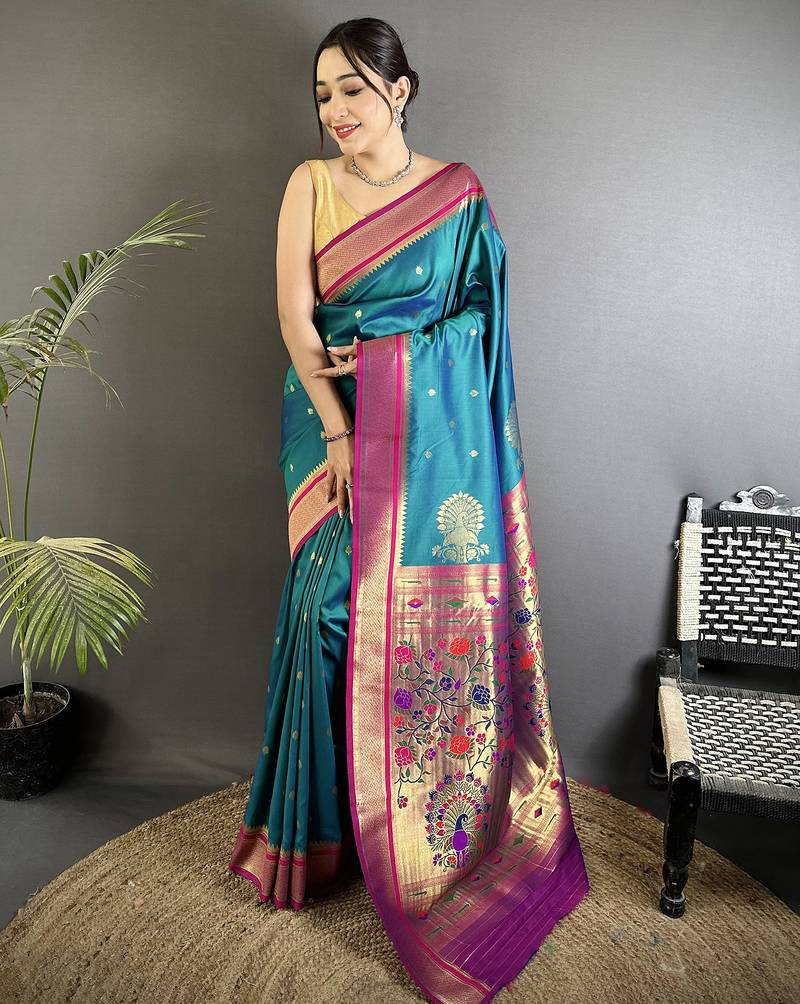 Women teal peacock&floral motifs lichi silk saree