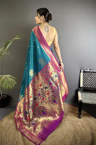 Women teal peacock&floral motifs lichi silk saree
