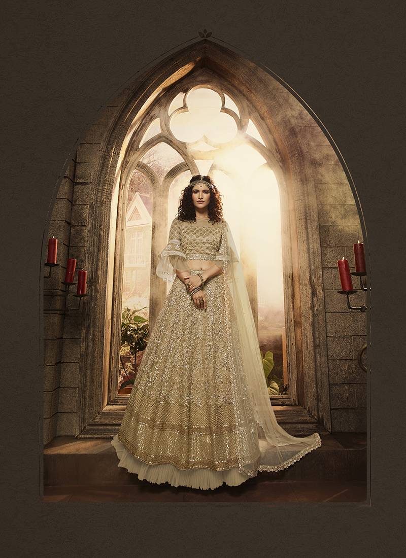 Soft Premium Net Wedding Wear Lahenga In Gold Embroidery Work & Sequance work