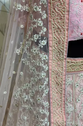 Soft Premium Net Wedding Lehenga In Pink With Embroidery & Crystal Stone Work