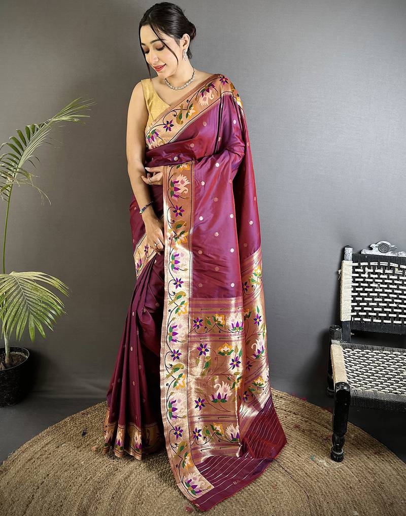 Women maroon floral & meena weaving lichi silk saree