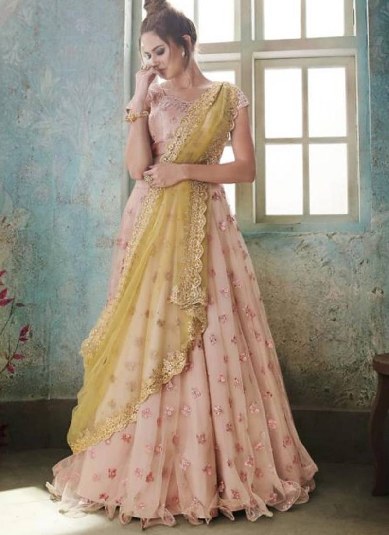 Soft Premium Net Party Wear Lehenga In Peach Color With Embroidery Work & Stone Work