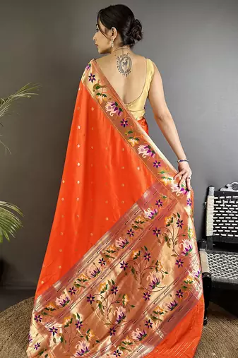 Women orange floral & meena weaving lichi silk saree