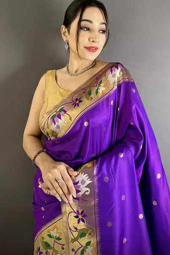 Women purple floral & meena weaving lichi silk saree