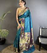 Women teal floral & meena weaving lichi silk saree