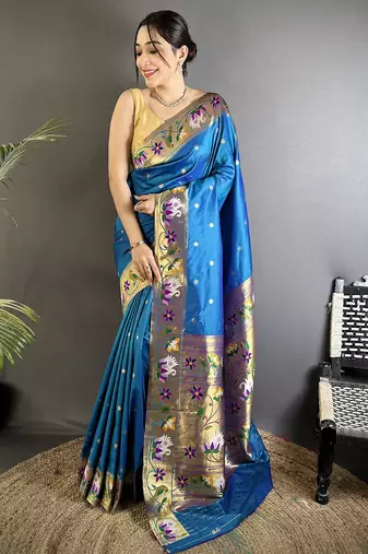 Women teal blue floral & meena weaving lichi silk saree