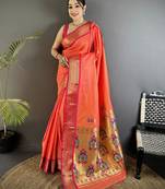 Women orange peacock ethnic motifs lichi silk saree