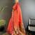 Women orange peacock ethnic motifs lichi silk saree