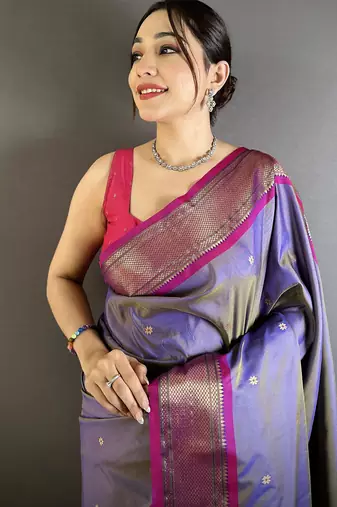 Women purple peacock ethnic motifs lichi silk saree