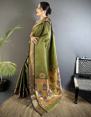 Women mehandi green peacock ethnic motifs lichi silk blend saree 2
