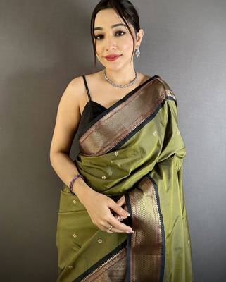 Women mehandi green peacock ethnic motifs lichi silk blend saree 4