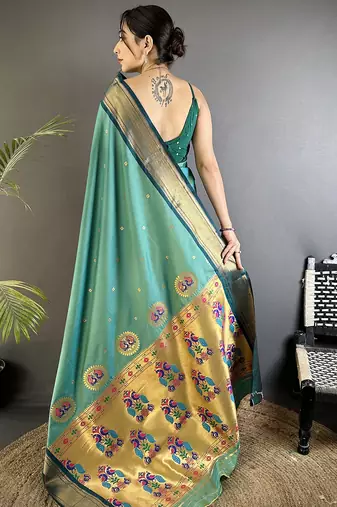 Women sea green peacock ethnic motifs lichi silk saree