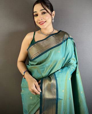 Women sea green peacock ethnic motifs lichi silk blend saree 4
