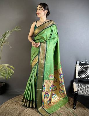 Women green peacock ethnic motifs lichi silk blend saree 1