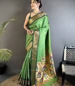 Women green peacock ethnic motifs lichi silk saree