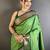 Women green peacock ethnic motifs lichi silk saree