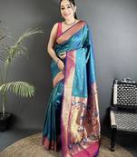 Women teal blue peacock motifs lichi silk blend saree