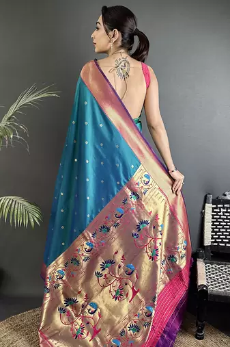 Women teal blue peacock motifs lichi silk saree