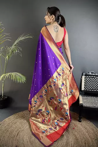 Women purple peacock motifs lichi silk saree