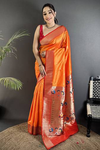 Women orange peacock motifs lichi silk saree