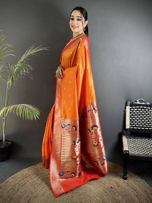 Women orange peacock motifs lichi silk blend saree 2