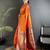 Women orange peacock motifs lichi silk saree