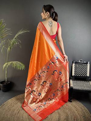 Women orange peacock motifs lichi silk blend saree 3