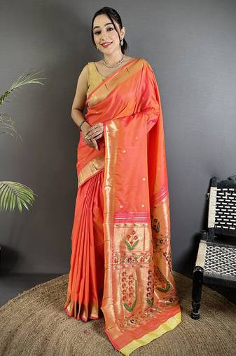 Women orange floral ikkat motifs lichi silk saree