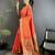 Women orange floral ikkat motifs lichi silk saree