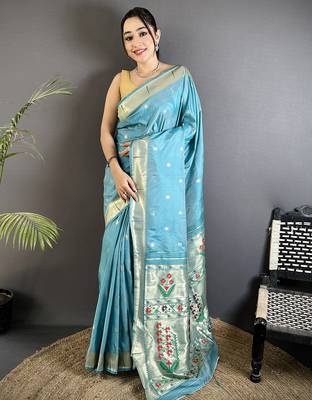 Women sky blue floral ikkat motifs lichi silk blend saree 1