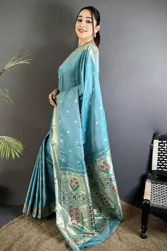 Women sky blue floral ikkat motifs lichi silk saree