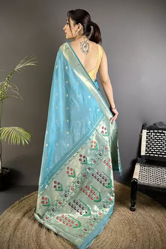Women sky blue floral ikkat motifs lichi silk saree