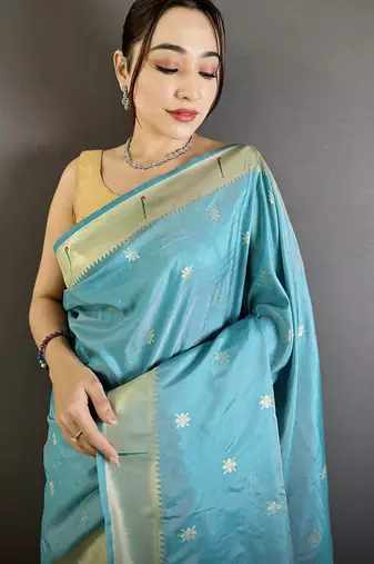 Women sky blue floral ikkat motifs lichi silk saree
