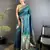 Women azure turquoise floral ikkat motifs lichi silk saree