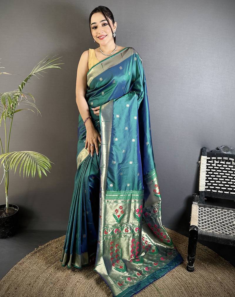 Women azure turquoise floral ikkat motifs lichi silk saree