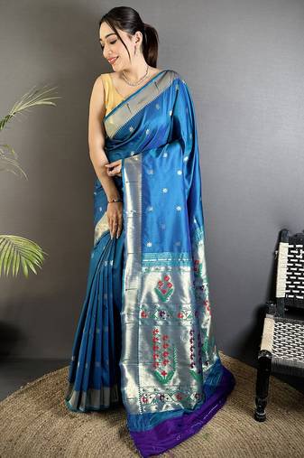 Women blue floral ikkat motifs lichi silk saree