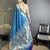 Women blue floral ikkat motifs lichi silk saree