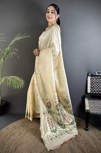 Women cream floral ikkat motifs lichi silk saree